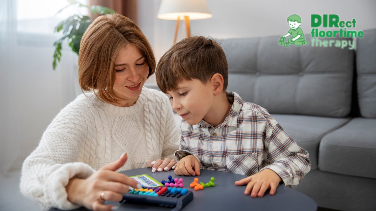 A female therapist plays with puzzle pieces alongside a child, using the DIR Floortime model to support skill development.