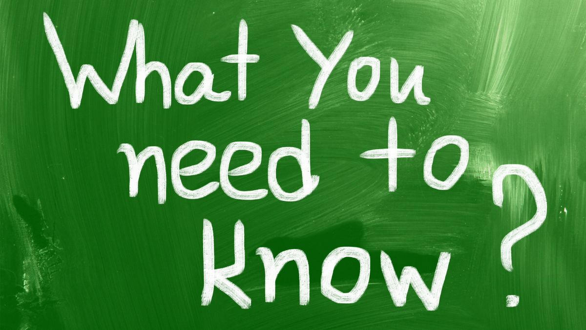 Green chalkboard displaying the words "What You Need to Know," representing essential information about autism summer regression and strategies for supporting autistic children during school breaks.