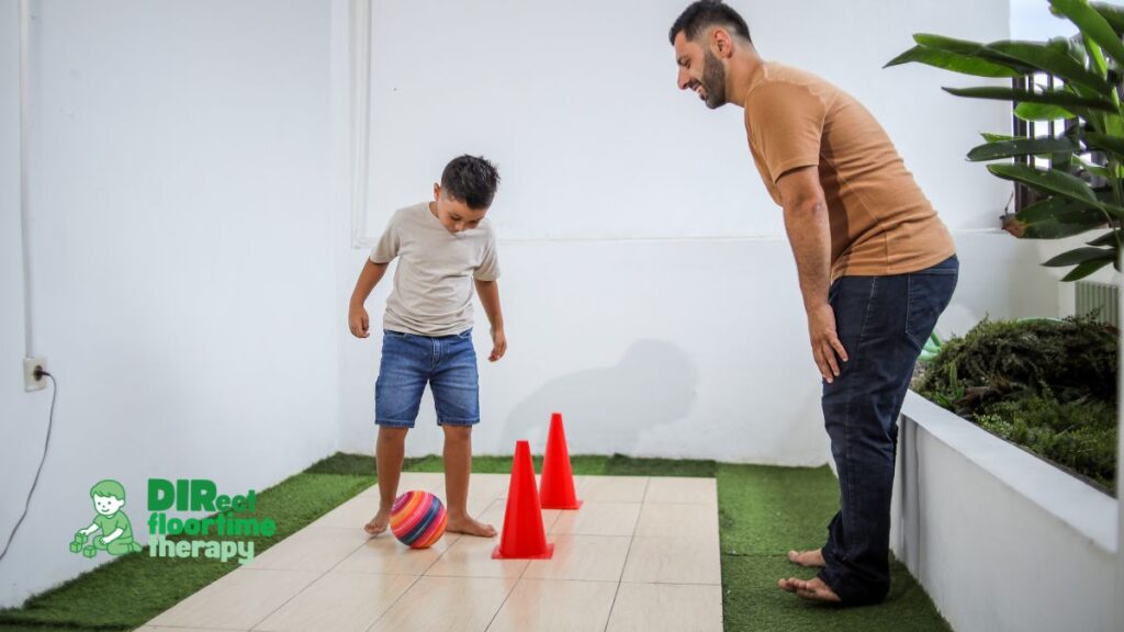 Father coaching child through obstacle course and ball activity during DIRFloortime therapy session to support motor skills, communication, and emotional regulation at home in New Jersey.