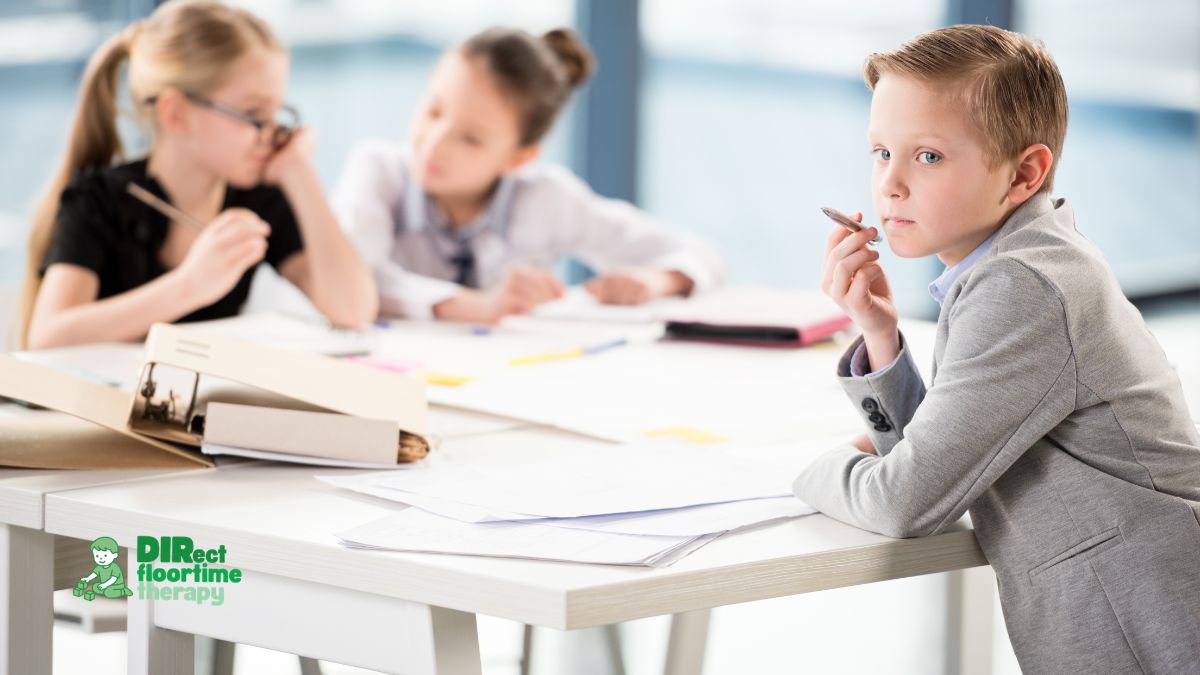 A fluent-speaking child at a table with peers, looking uncertain or disconnected during a conversation, capturing the experience of having words but missing the social language: 'autistic child peers conversation uncertain disconnected verbal speech social language'