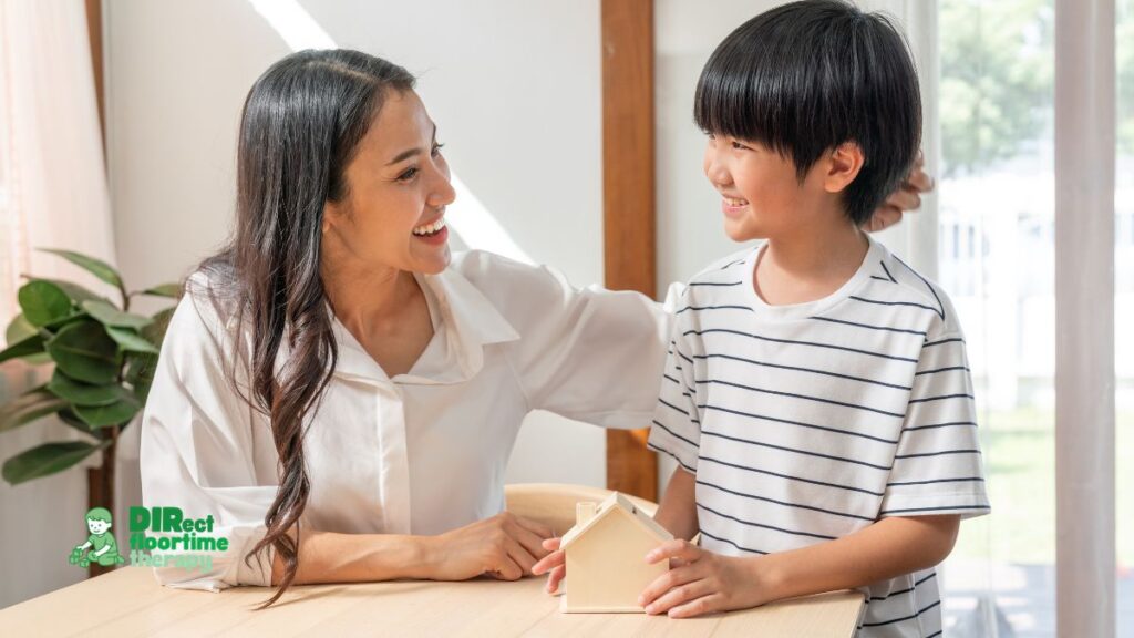 My Autistic Child Talks but Does Not Communicate: Understanding the Difference Between Speech and Social Language 1 A child speaking earnestly to a parent who is listening with warm attention, capturing a teaching moment about social communication in a home setting: 'autistic child parent conversation home warm engaged social language'