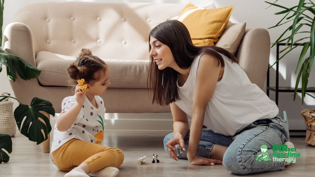 Parent and child sitting calmly on the floor together during a peaceful moment at home. Warm, natural lighting. Conveys safety, connection, and ease.